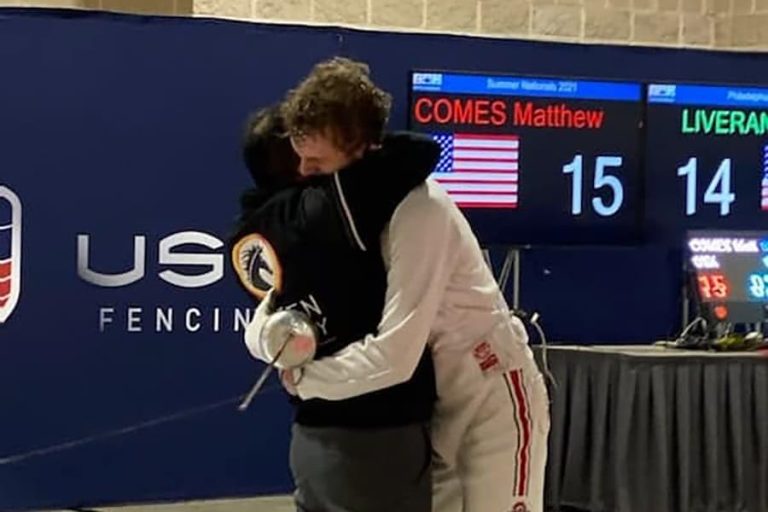 Kaizen Academy Coach Kevin And Champion Student Matthew Comes Hug