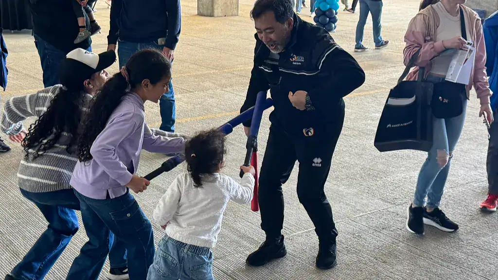 Kids in a fencing class